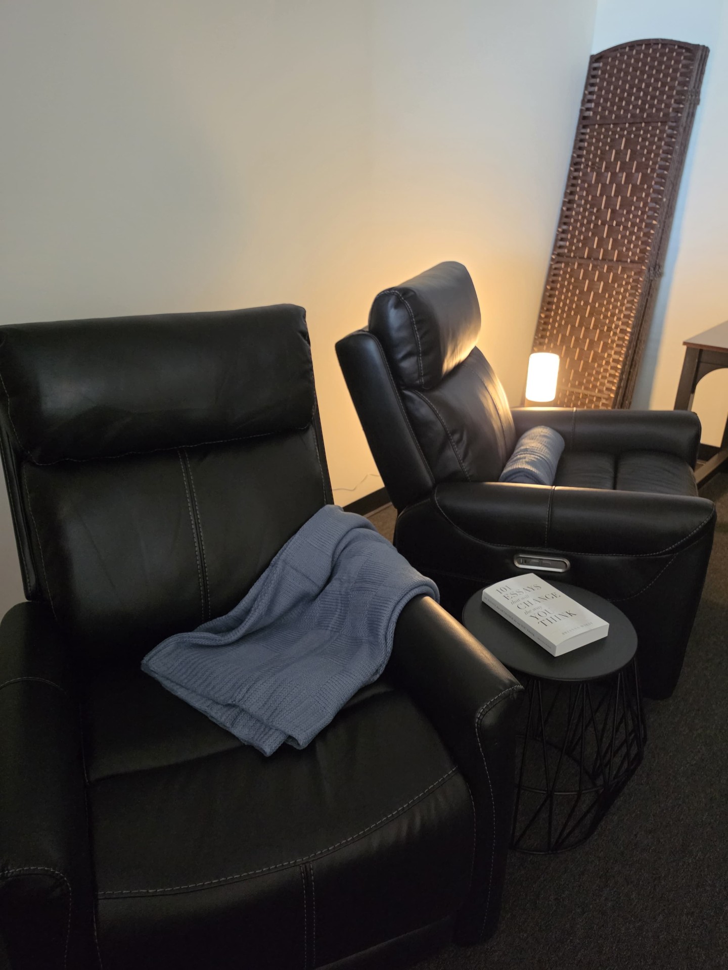 Comfortable therapy chairs in a calming office space